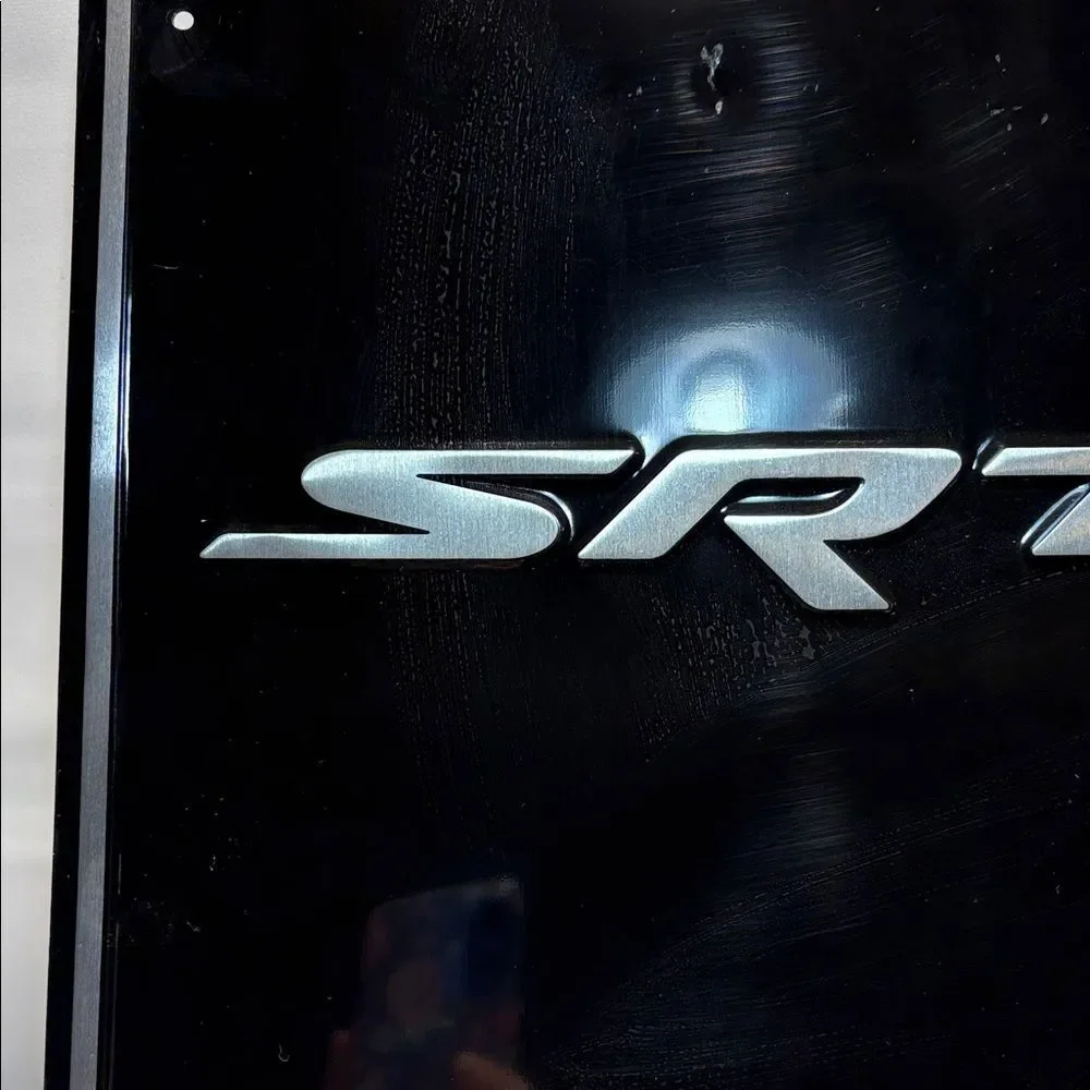 SRT Black and Silver Metal Sign